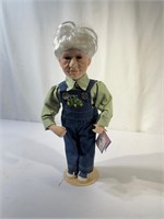 John Deere Porcelain Doll on Stand