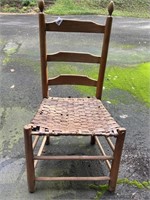 Ladder back chair with basket woven seat