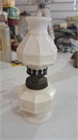 Antique milk glass oil lamp