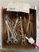 Box with large USA, wrenches.