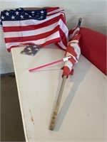 (2) new American flags with flag on 5’ wood pole.