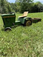 Vintage John Deere pedal tractor with trailer