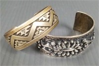 2 signed sterling decorated cuff bracelets -