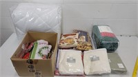 Group of bedding, tablecloths and assorted fabric