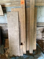 Various sizes and types of wood, including 2-5