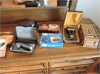 Selection of vintage shavers & a straight razor
