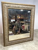 Rectangular framed mirror, dimensions are 22 x 26