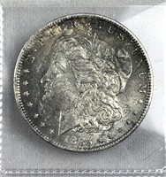 1885-O Morgan Silver Dollar, Toned/Luster