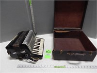 Castelli accordion in a hard shell case