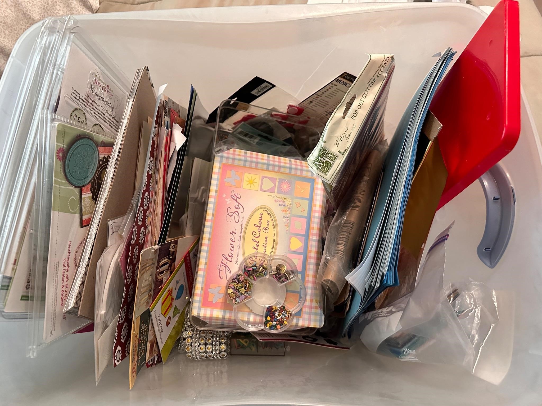 Tub full of various art supplies