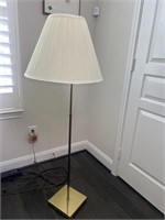 Brass portable floor lamp with swinging arm