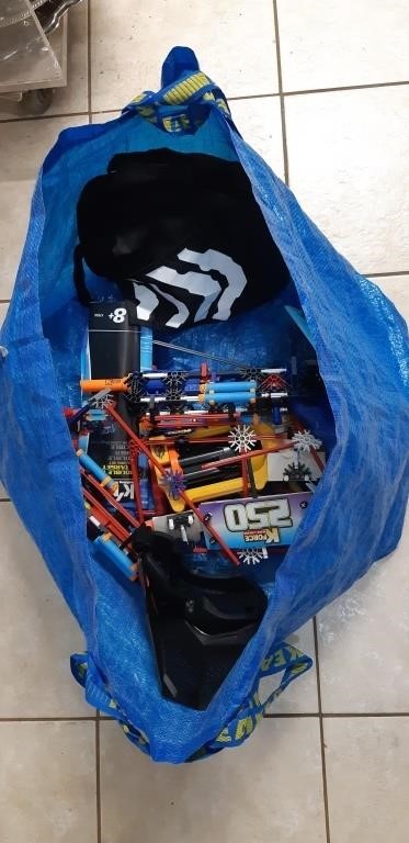Bag of K-Nex shooting gun toys, suits and more