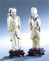 2 Chinese carved figures.