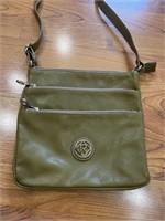 C10) Olive green purse.Like new!Has one flaw shown