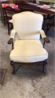 Wood and upholstery sitting chair