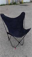 Black metal and cloth folding lawn chair