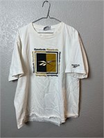 Vintage Reebok Gold and Black Logo Shirt