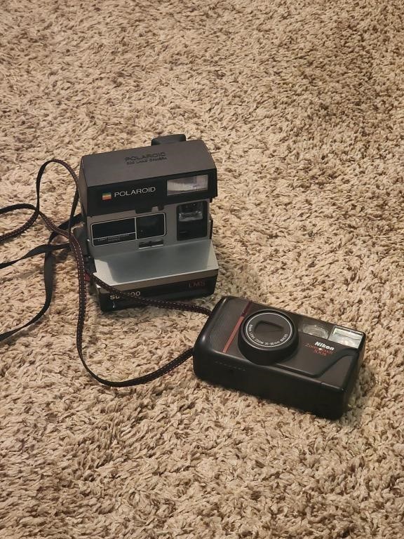 Polaroid Camera and Nikon