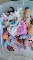 Tote of dolls & stuffed animals