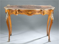 French marquetry table with metal mounts.