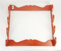 Wall mounted rifle rack holds 4 rifles