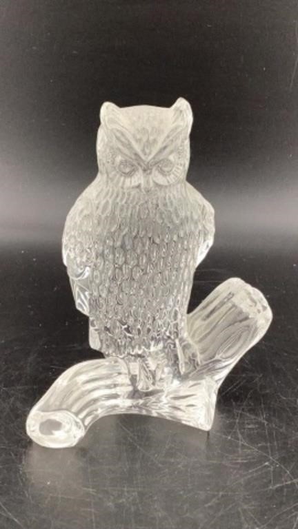 Glass owl on a limb