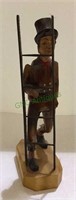 Carved wooden man with ladder measuring 11 inches