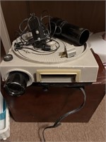 Projector with two slides