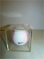 Nike Autographed Baseball in Case Unknown