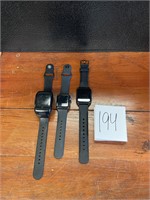 Apple watch and 2 fitness watches