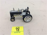 Tractor with Timex wheel clock, 1/64 scale