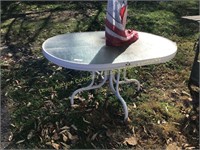 Oblong glass top patio table. No chairs