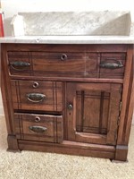 Marble top washstand with drawers and cabinet