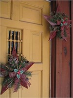 Pair of metal Christmas stars