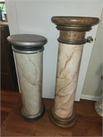 Two large wooden pedestals