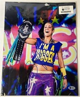 N - BAYLEY SIGNED 8X10 W/ COA (B121)