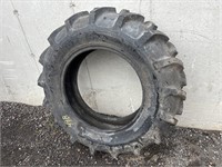 Tire: 12.4–24, weathered