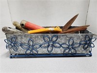 Flower planter with gardening tools