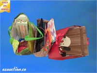 Three carry bags of Christmas items. Gift bags