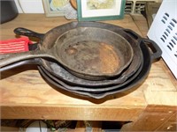 stack of iron skillets