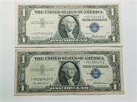 OF) Two STAR NOTES 1957 $1 silver certificates