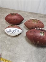 Wilson signed footballs by AJ Hawk, Pat Lee #22,