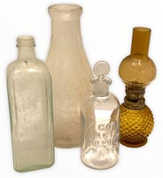 Vintage Glass Bottles and Oil Lamp