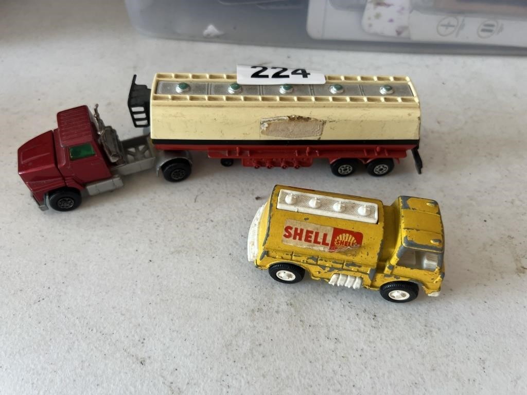 2 Small Toy Trucks U234