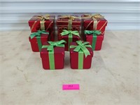 Eight small decorative Christmas boxes