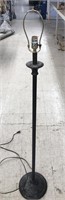 Black floor lamp measuring 57” tall