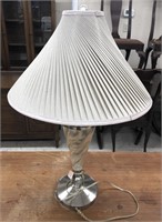 Swirled base table lamp measuring 31” tall