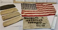 Box military hats, flag, and Gettysburg address