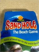 sand hole beach game