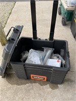 Rigid tool crate on rollers w assorted tools